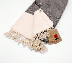 Bazaar Anatolia versatile towel doubles as shawl or travel blanket.