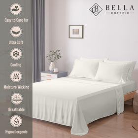 BC Bella Coterie king-size bamboo sheet set in ivory for luxurious sleep.