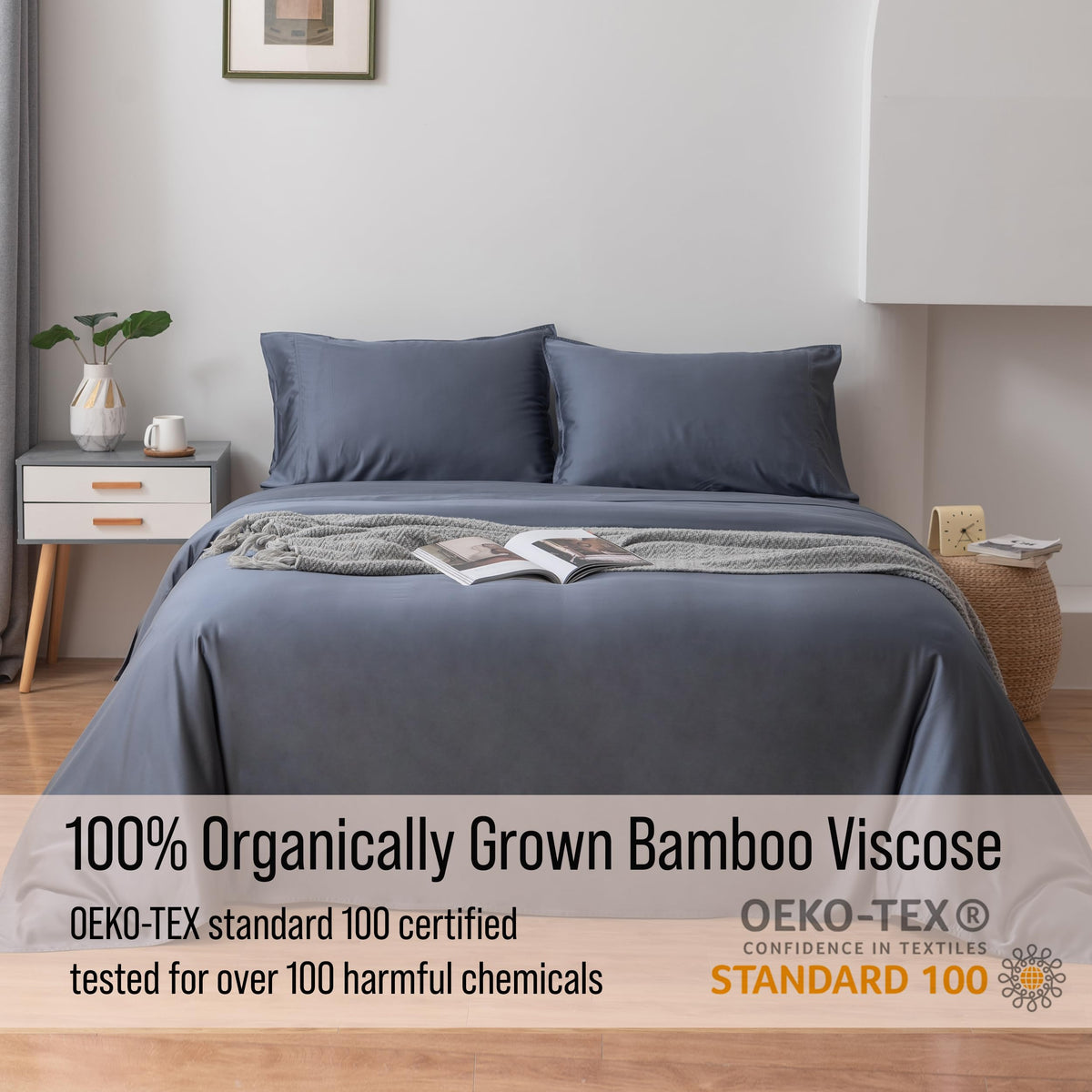 Bella Coterie slate blue flat sheet draped over bed for a luxurious look.