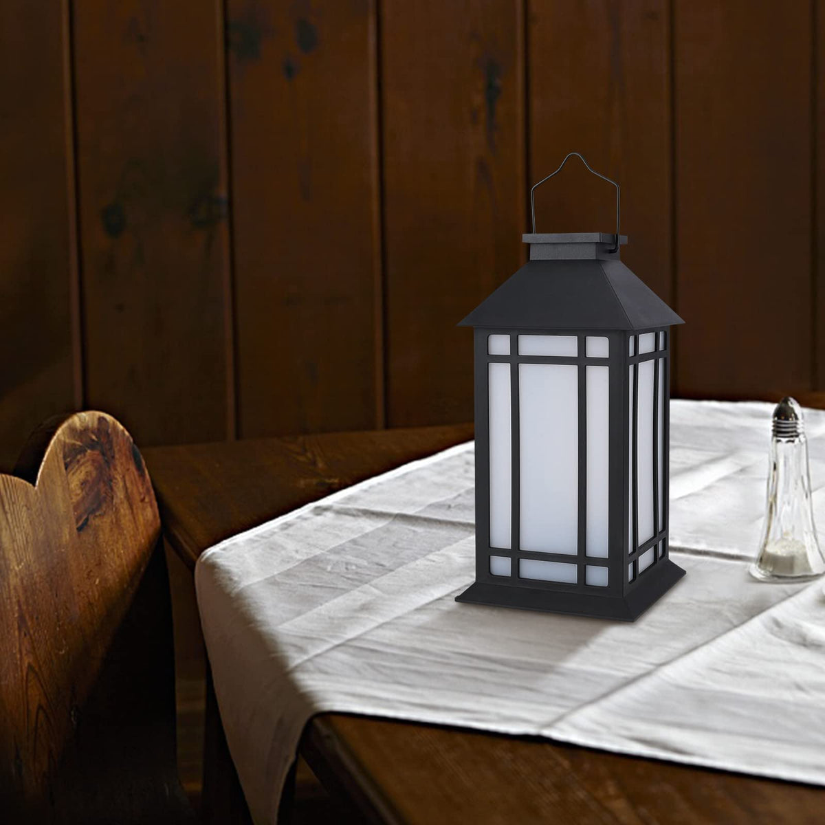 Outdoor patio setup with Bdor lanterns providing soft illumination