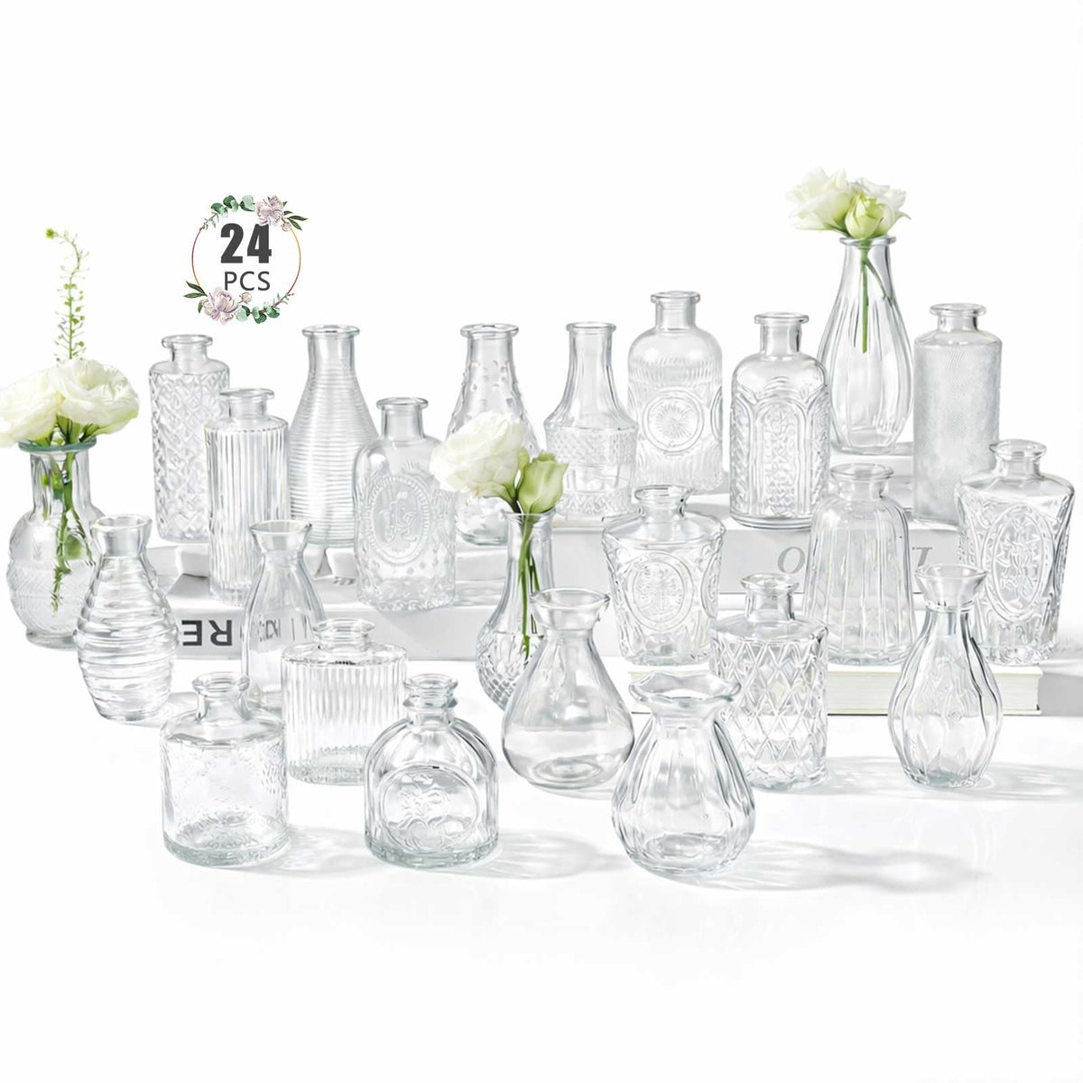 BEAHOT 24-pack glass bud vases in various shapes for elegant centerpieces.