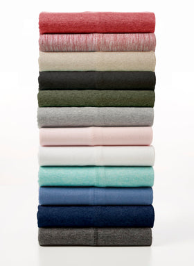 BED INC Road Trip America Jersey Sheets bedroom-scene on bed for a luxurious look.