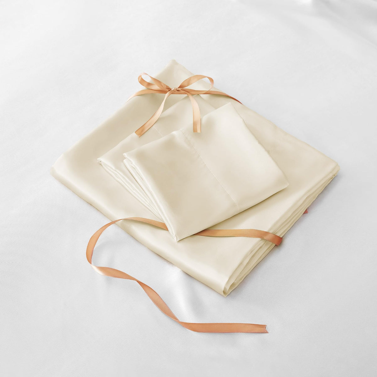 BEDELITE satin sheets on bed create a luxurious bedroom mood
