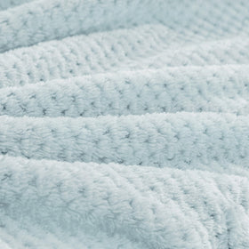 BEDELITE folded blanket used as a portable pillow for rest.