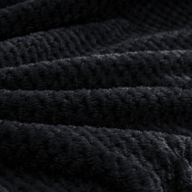 Compact fold showcases BEDELITE blanket as pillow substitute during travel.