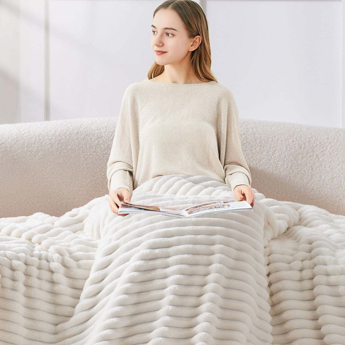 BEDELITE decorative striped blanket adds stylish texture to a bedroom.