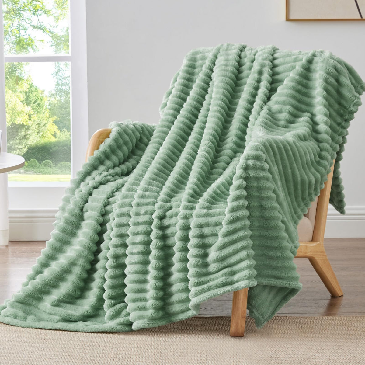 BEDELITE fleece green throw on couch showcases plush warmth and stripes