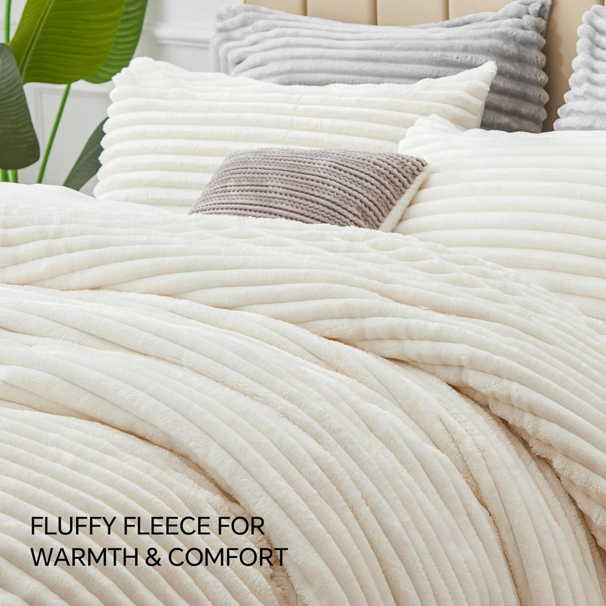 BEDELITE comforter draped on bed with layered styling