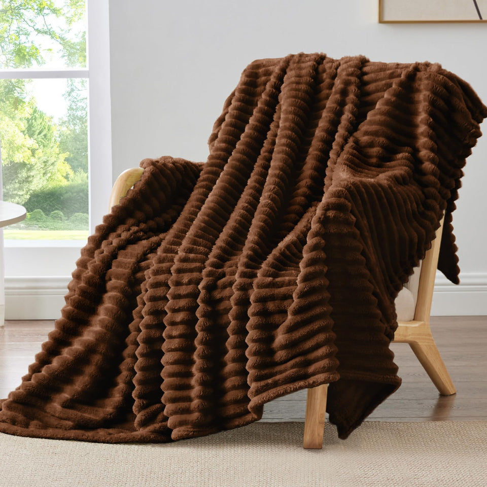 BEDELITE fleece throw on sofa showing plush warmth for cozy evenings