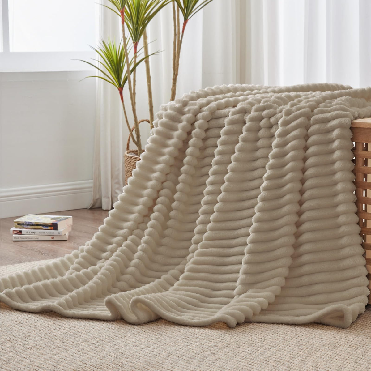 BEDELITE fleece throw ideal for camping or travel with lightweight warmth.