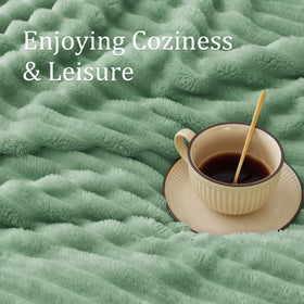 BEDELITE green throw folded neatly for quick styling