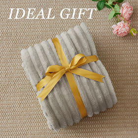 BEDELITE blanket draped on bed highlighting versatile decor