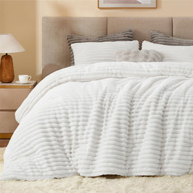BEDELITE micro-mink side close-up with silky texture and luxurious warmth.