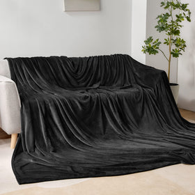 BEDELITE oversized king blanket on couch demonstrates extra-large warmth