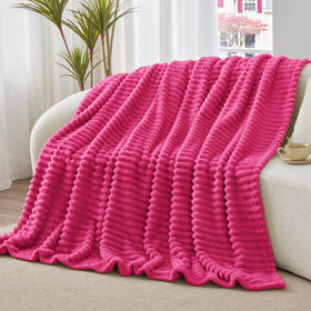 BEDELITE pink couch blanket; soft touch enhances relaxation during movie nights.