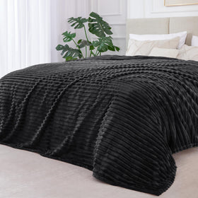 BEDELITE plush throw on sofa enhances decor and comfort