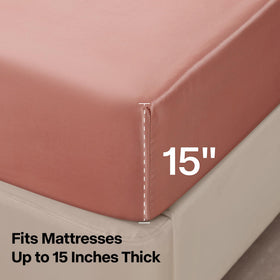 BEDELITE bedroom scene with rose pink satin sheets creating calm ambience