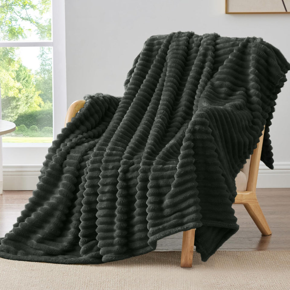 BEDELITE striped blanket adds warmth and decor to the couch