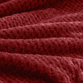 BEDELITE blanket folded into a compact pillow-ready shape.