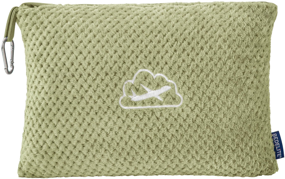 BEDELITE travel blanket with luggage sleeve attached to a suitcase for easy transport.