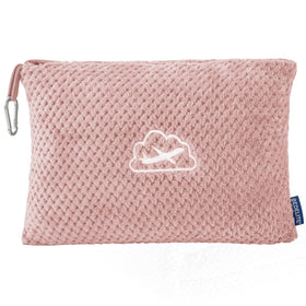 BEDELITE travel blanket in pink folded in its bag for compact packing.