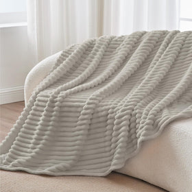 BEDELITE blanket in a travel setting suggesting portability