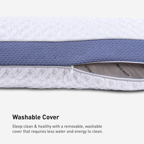 Pillow with machine-washable cover shown for simple maintenance.