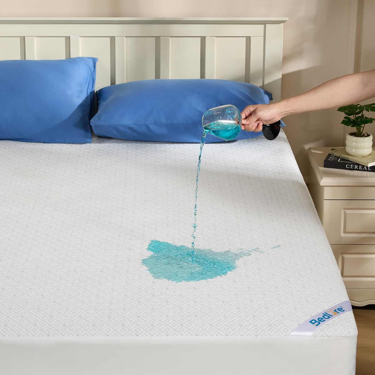 BEDLORE King Mattress Protector waterproof layer protecting the mattress from spills.