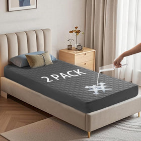 BEDLORE twin-xl gray mattress protector folded, ready to protect against spills