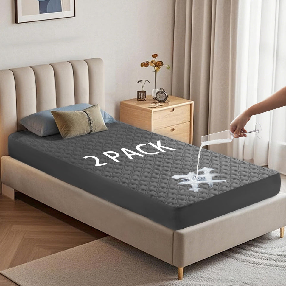 BEDLORE twin-xl gray mattress protector folded, ready to protect against spills