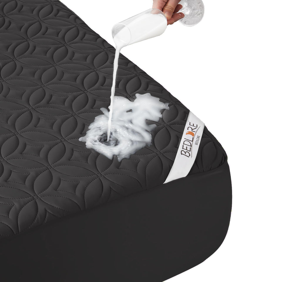 BEDLORE waterproof mattress protector twin with breathable fabric for spill protection.