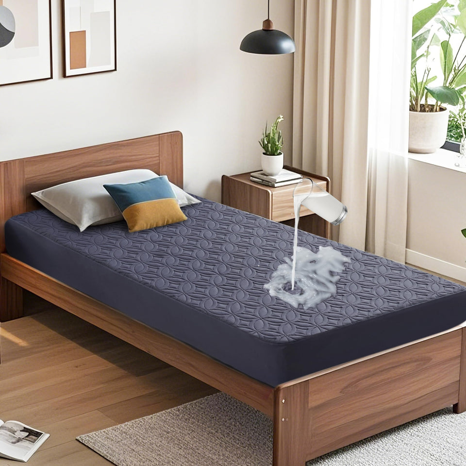 BEDLORE waterproof mattress protector in navy guards against spills on Twin XL beds