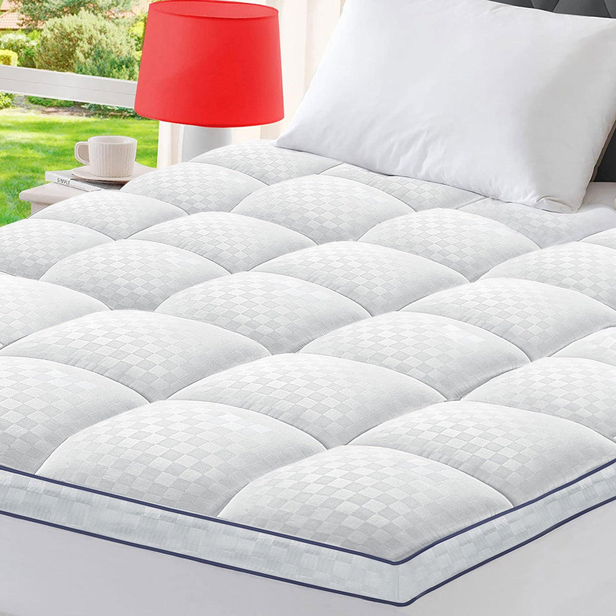 BedLuxury queen pillowtop topper adds plush comfort and even weight distribution.