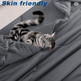 Bedsmile cooling comforter ready for travel use, compact and lightweight.