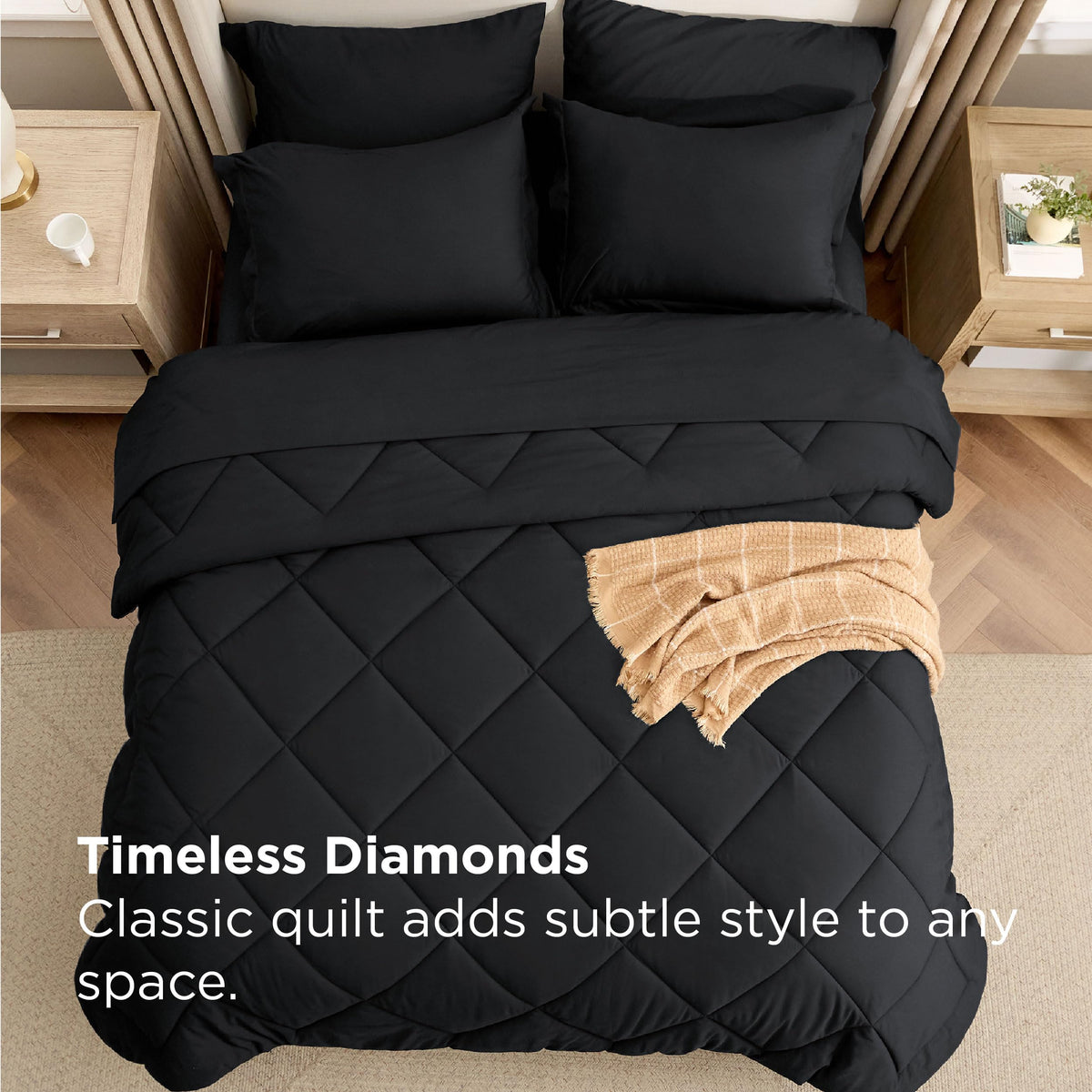 Bedsure 14-inch deep-pocket fitted sheet anchors the set in place in black