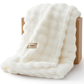 Bedsure 3D Fleece Bubble blanket on a couch adds cozy warmth and texture.