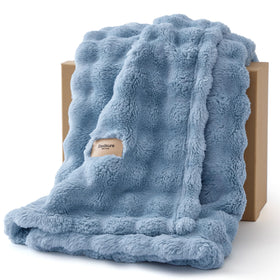 Bedsure 3D Fleece Bubble Blanket on a couch with cozy texture for everyday lounging.