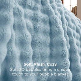 Bedsure blanket draped over sofa for year-round comfort.