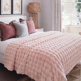 Bedsure pink 3D bubble blanket in bedroom decor highlighting style and softness