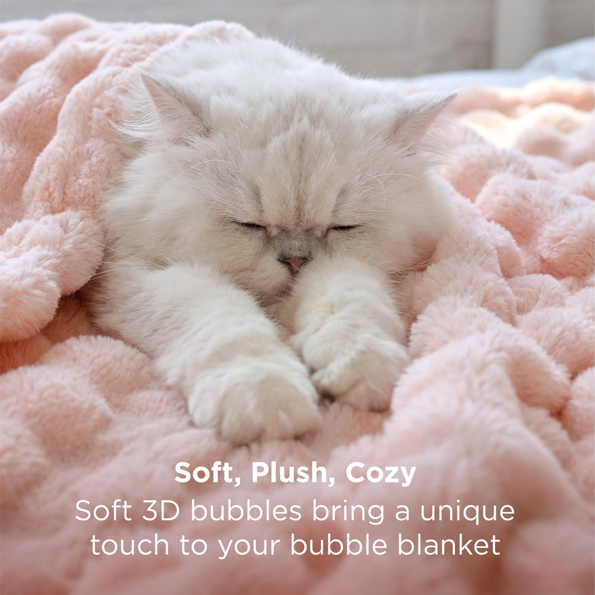 Bedsure pink blanket on couch adds cozy living room ambiance