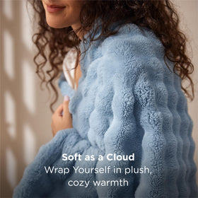 Bedsure 3D Fleece Bubble Blanket on a sofa showing gentle warmth for movie nights.