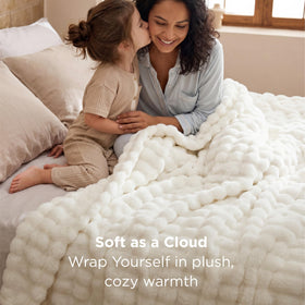 Bedsure 3D Fleece Bubble blanket draped on bed for chic decor.
