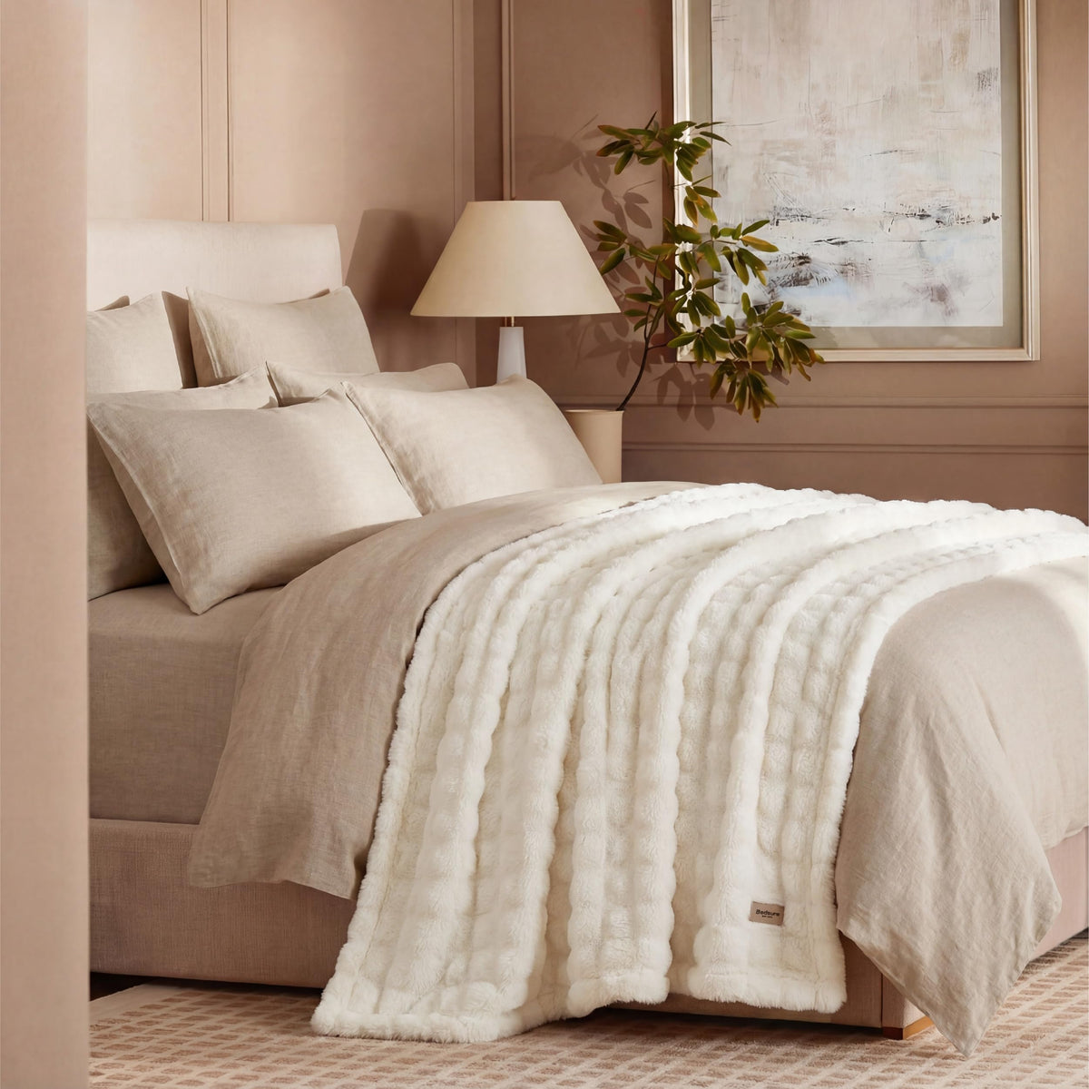 Folded Bedsure blanket in a bedroom adding warm, inviting layers.