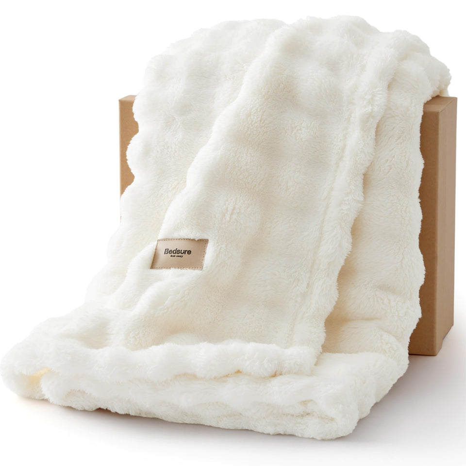 Bedsure 3D Fleece Bubble blanket on sofa with cozy texture and warmth.