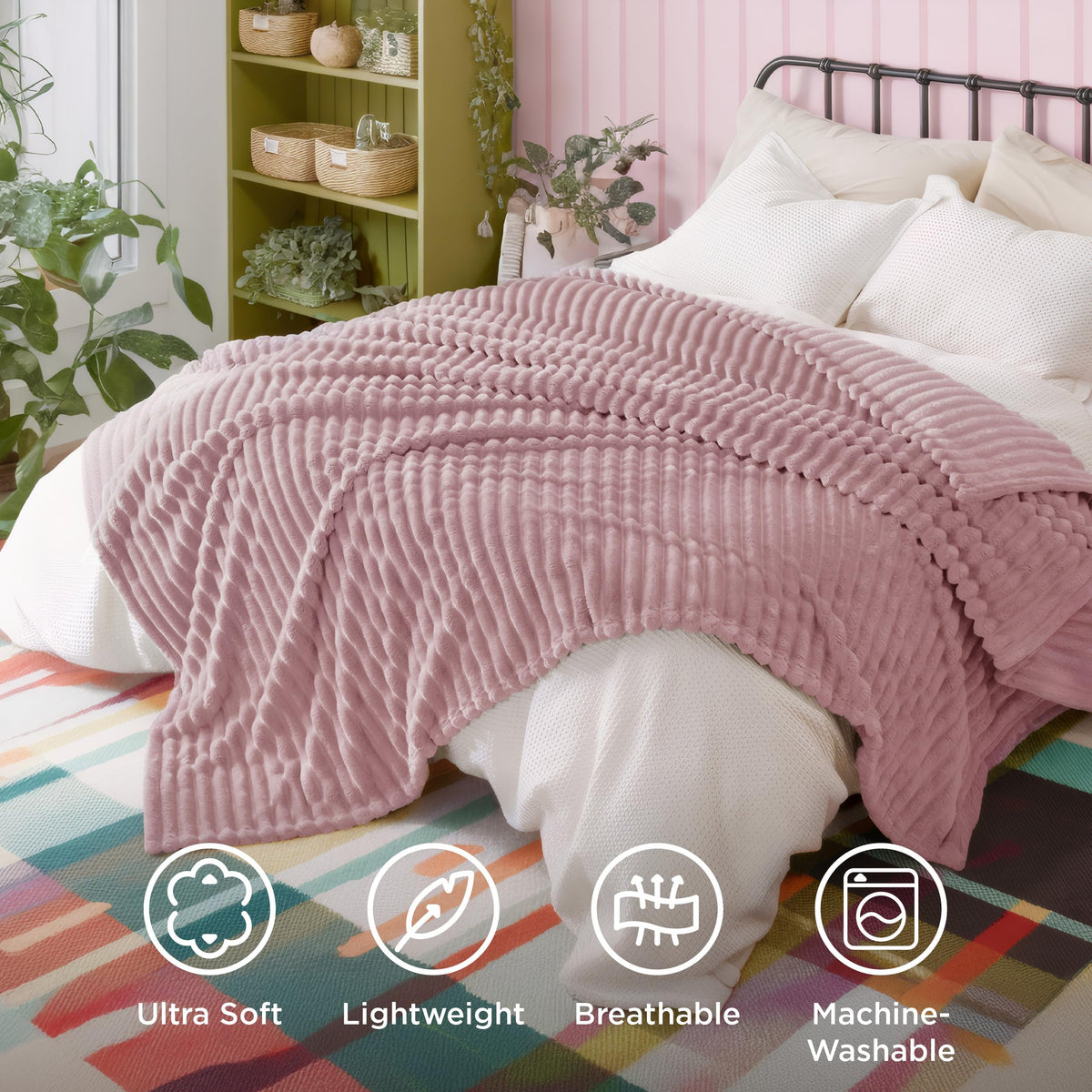 Bedsure 90x90 pink blanket draped beside bed for warmth and comfort.