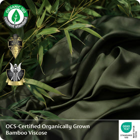 Bedsure olive green bamboo fabric close-up reveals silky softness.