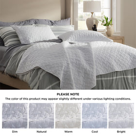 Bedsure all-season white bedspread provides versatile warmth without bulk.