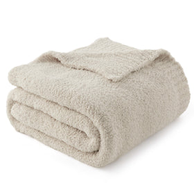 Bedsure beige knit throw blanket on couch offers ultra-soft warmth.