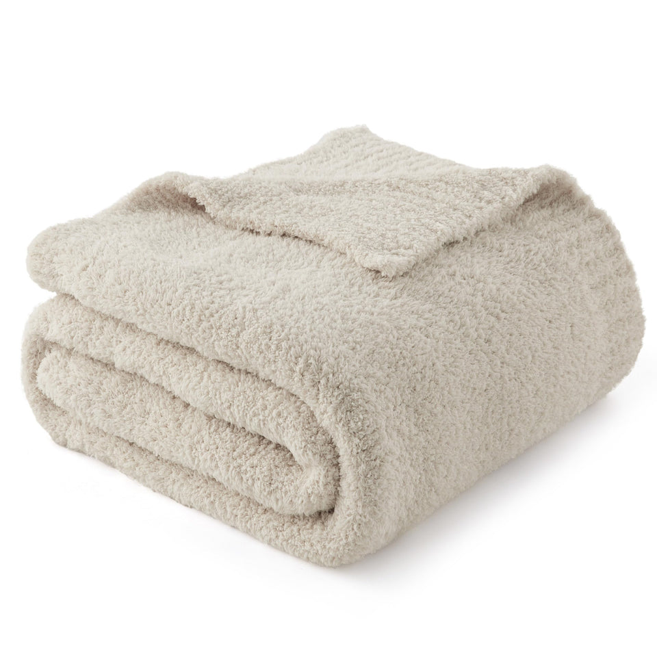 Bedsure beige knit throw blanket on couch offers ultra-soft warmth.