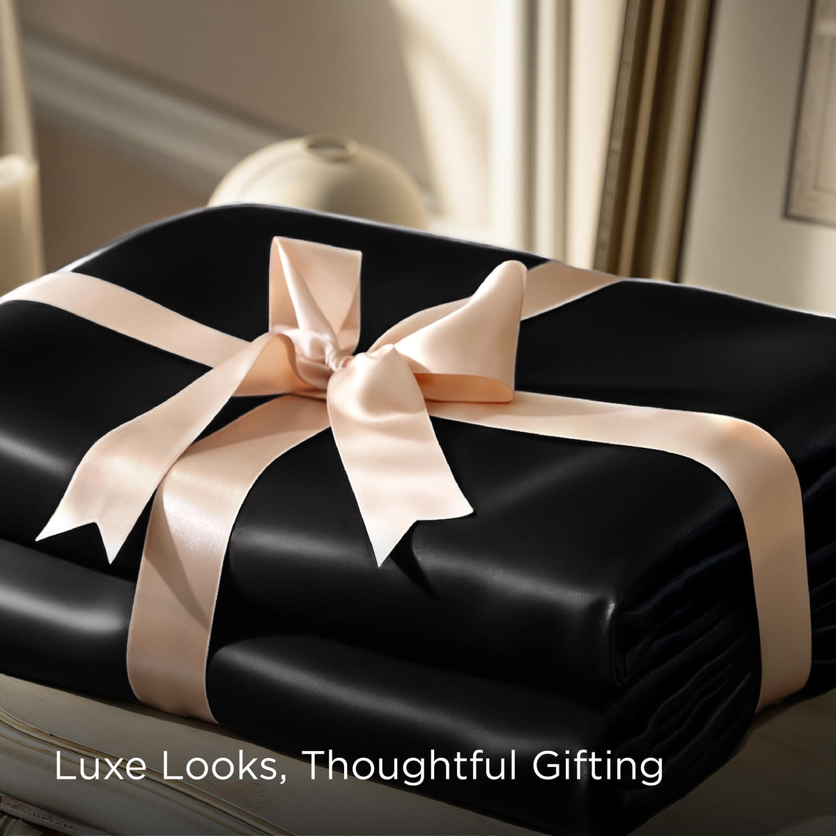 Bedsure black satin sheets set shown as complete ensemble with two pillowcases